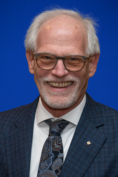 Headshot of Thomas Coughlin.